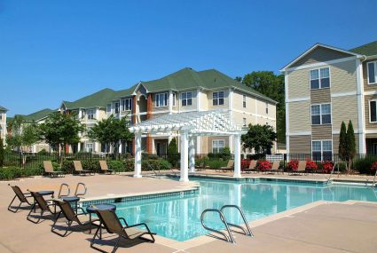A swimming pool outside of a Donaldson apartment community